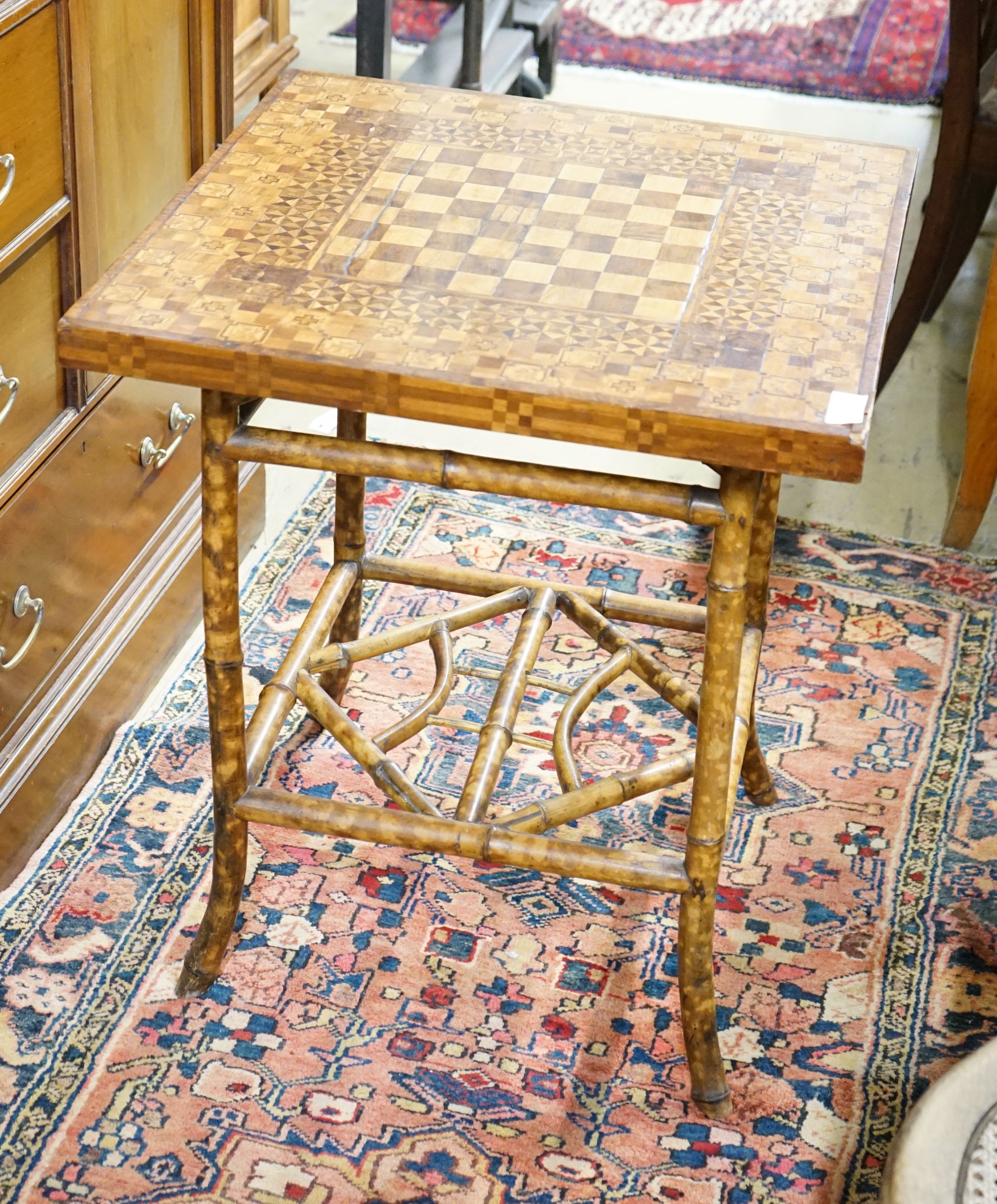 A Victorian bamboo parquetry topped games table, width 59cm, depth 59cm, height 69cm